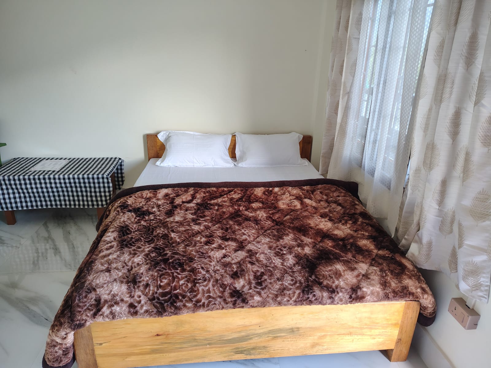 Comfortable double-bed room at Kyit-Pu Comfort Stay